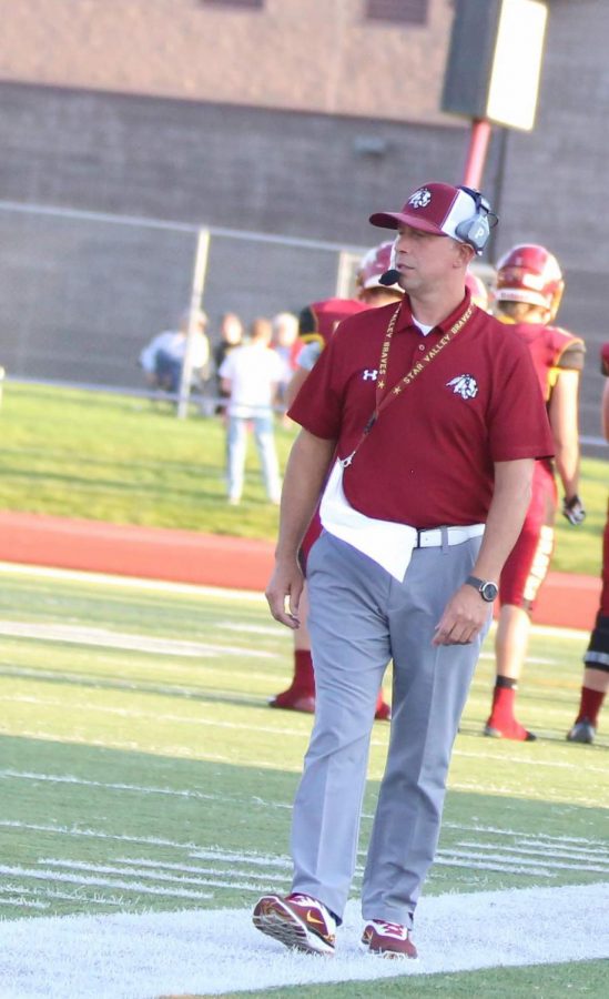 STRUTTIN%3A+Mr.+Patterson+walks+along+the+sideline+scoping+out+the+competition.+Patterson+has+spend+most+his+career+coaching+football+and+wrestling.