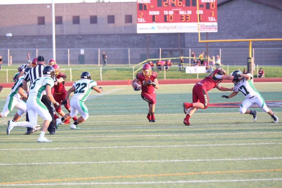 1K%3A+Junior+RJ+Cazier+runs+down+the+field+during+the+first+home+game+of+the+season.+%C2%A0Cazier%2C+who+went+over+1%2C000+yards+on+the+season+on+Oct+26+against+Worland%2C+said%2C+%22To+be+honest%2C+I+never+thought+I+would+ever+run+for+1000+yards%2C+especially+not+my+junior+year.%22