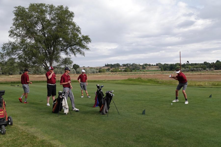 TEEING OFF: Preston Kilroy, Coach Johnson, Jake Johnson, Karsen Spaulding, and Tyler Hodges all enjoy some tee time together at the Riverton Golf and Country Club in Riverton Wyoming. These Braves earned the chance to play together due to the tournaments unique matchplay format. It was a great experience playing with my teammates in Riverton, said junior Karsen Spaulding.