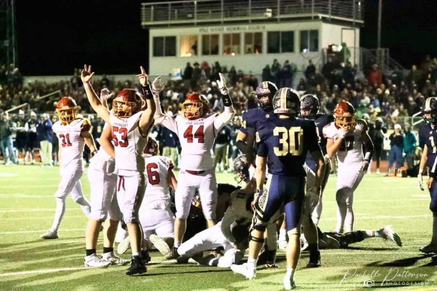 SCORE: The Braves celebrate after sophomore Tristen Hilton scores against Cody. The line opened a big hole for me, and I went through it. It was my first touchdown playing varsity, so I was excited, said Hilton.