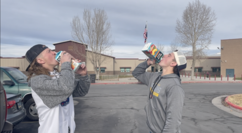 CHUG CHUG CHUG: Seniors Taggart Heward and Lane Oesch compete by drinking ice cold peach punch.