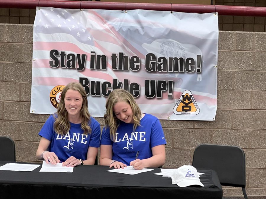I ACCEPT: Seniors Mickey Frazier and Sara Mcken sign to accept their offer to attend Lane College for the upcoming fall semester to participate in sports they love. Even though we arent going to be on the same team, we are still excited to be able to room together and make many more memories, they said.