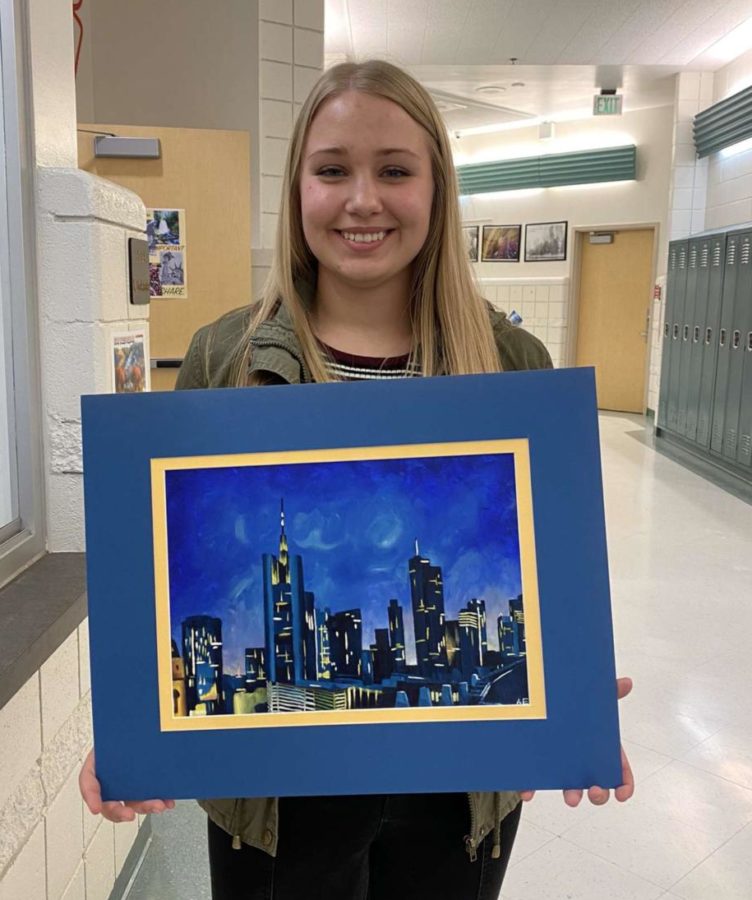 Ashlynn Erickson: “Night Sky” feels like the 80’s. Ashlynns inspiration for this painting was the famous “Starry Night by Vincent van Gogh. Although there’s crazy lights and city chaos going on, she claims that she wanted people to feel and understand the peaceful lit up night it is in the city she drew. Ericksons first masterpiece took her about two weeks, lots of effort for a beautiful outcome. She used oil paints for this project. “I like oil paints because of how easily they blend together, making art easier. 