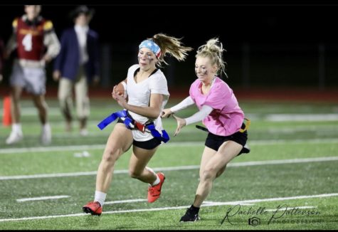 FAST LEGS: Sophomore Haley Robison tries to escape Avery Kabonic in an effort to get a first down.