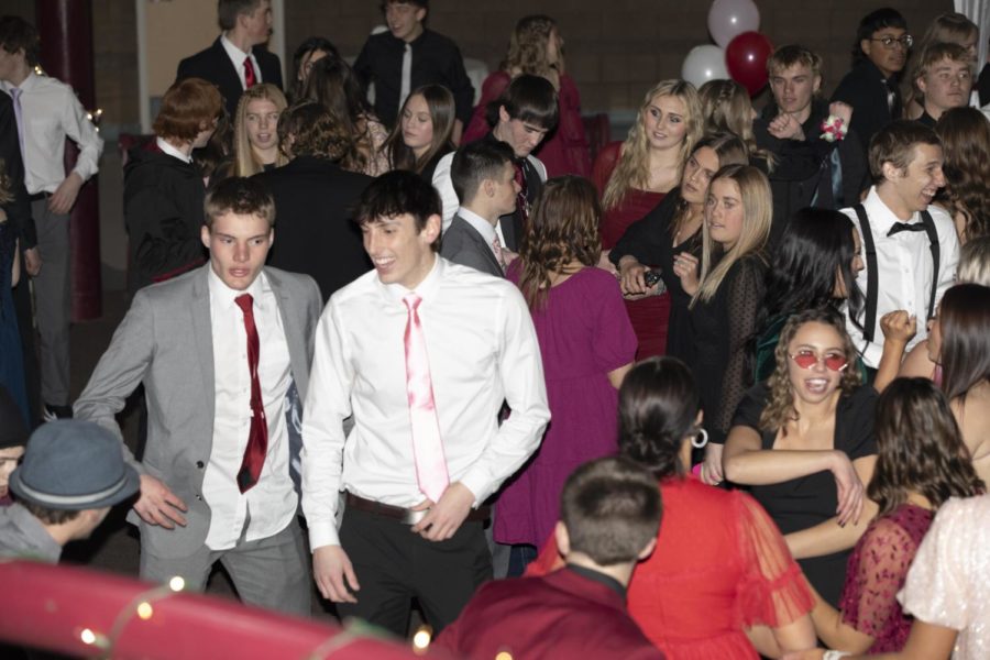 SIDE EYE: Freshman Italy Erickson checks out her classmates dance moves. The dance was really fun; the energy was definitely there, Erickson said.