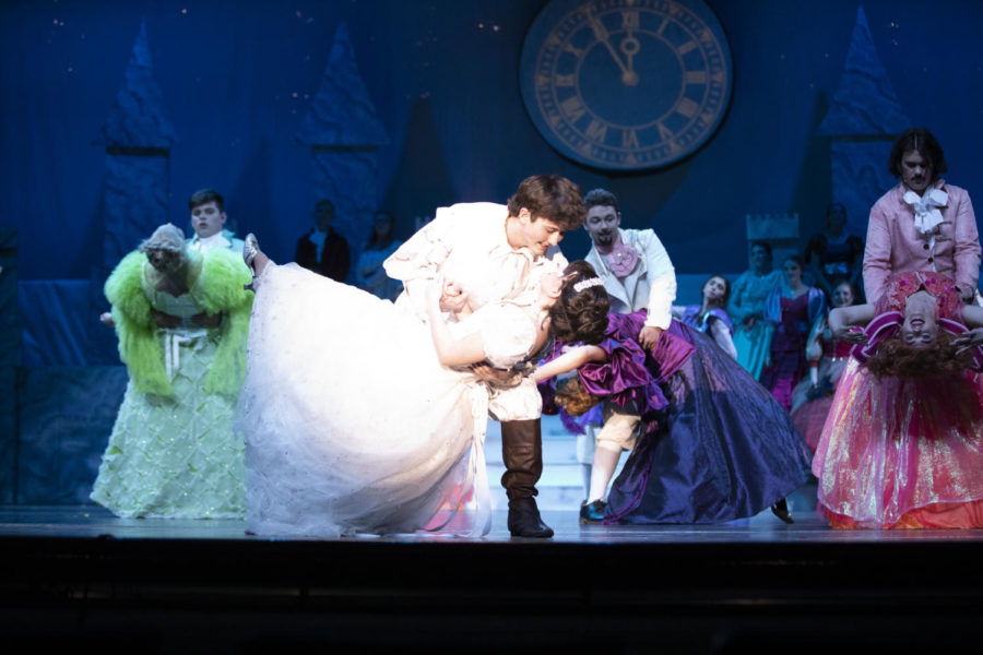 GET LOW: Prince Charming and Cinderella dance at the ball. Wes Brog played the humble prince and Addie Waldron played Cinderella. The cast for the ballroom scene had to spend five two-hour practices learning the dance and blocking. Twenty minutes of Broadway choreography was exhausting, said Waldron.