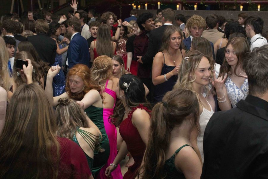 RAGERS: Promgoers fill the commons area decorated in Cottage decor.