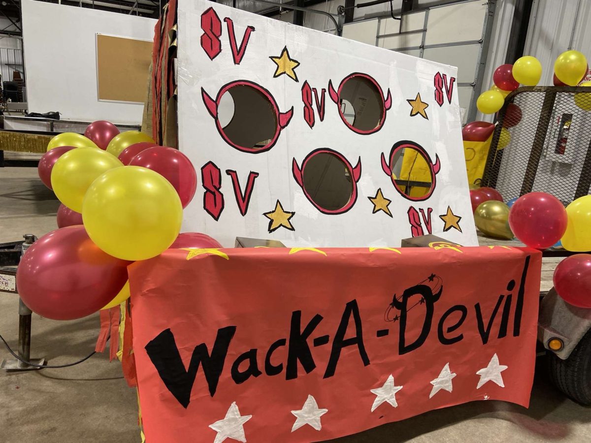 GAME ON: Art Clubs homecoming float awaits the parade. Art material needed for class, and even float building, is going up in price, putting pressure on the art departments budget. 