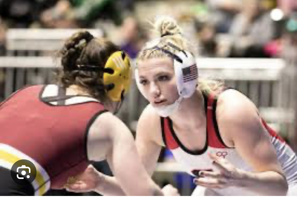 FACEOFF%3A+Freshman+Cara+Andrews+advancES+on+her+opponent+Meadow+King+in+the+145+lb.+state+wrestli+ng+finals+match.+Andrews+lost+the+match+but+she+battled+her+more+experienced+opponent+hard.+I+didnt+think+I+could+hang+with+her+but+I+ended+up+doing+better+than+I+though+I+could.