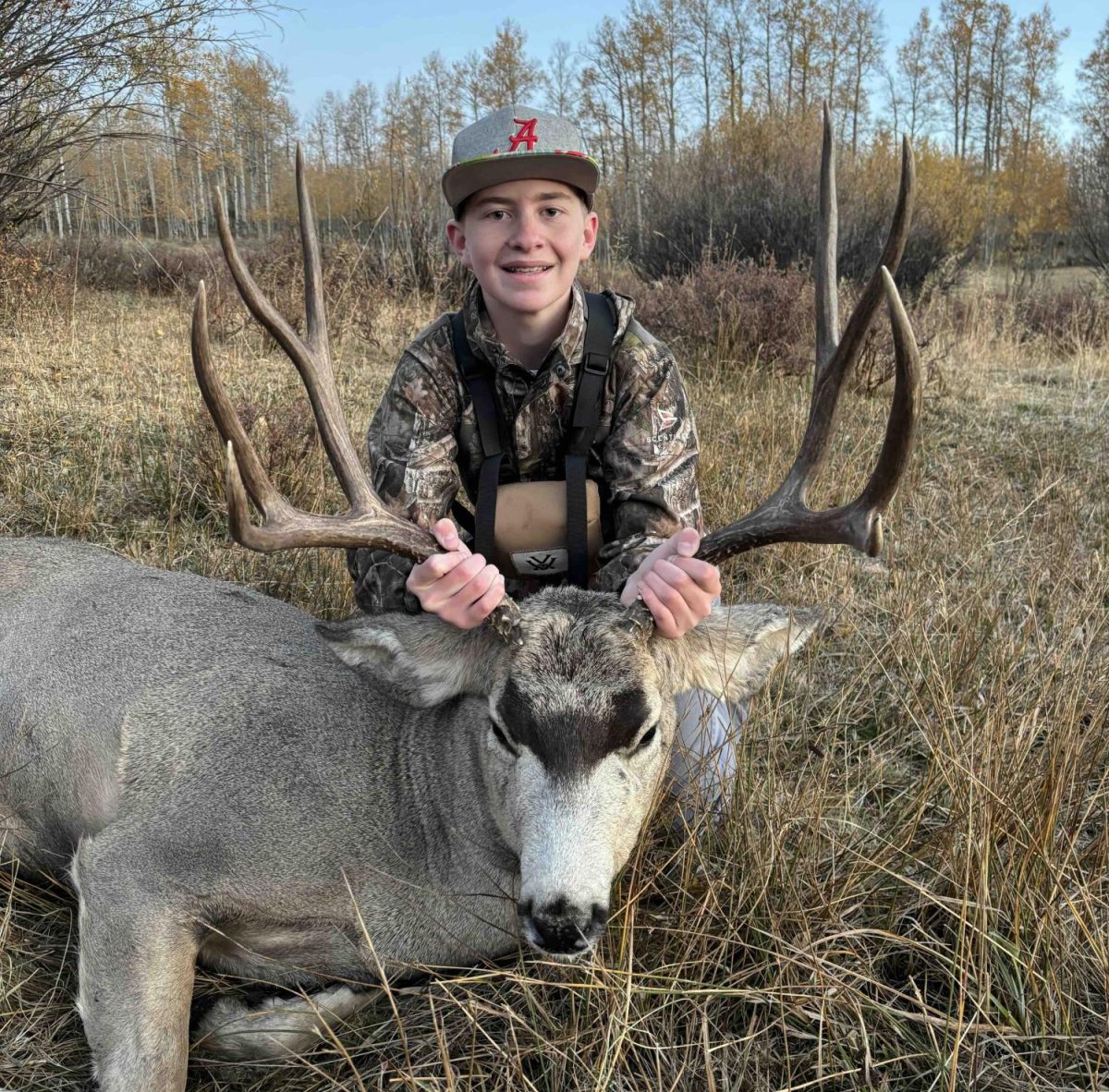 Bradyn Hirschi (9) The hardest part about hunting this deer was hitting him on the first shot because he was running at 300. The thing I like the most about the deer I shot is how big his antlers are.