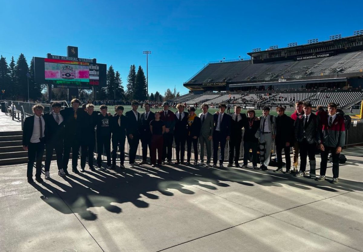 GO FIGHT WIN: Back-to-back state champ Braves arrive at war memorial stadium. When they left, they were back-to-back-to-back champions. "There was a lot of nerves on the team as we got ready to play," said senior Hayden Morgan.