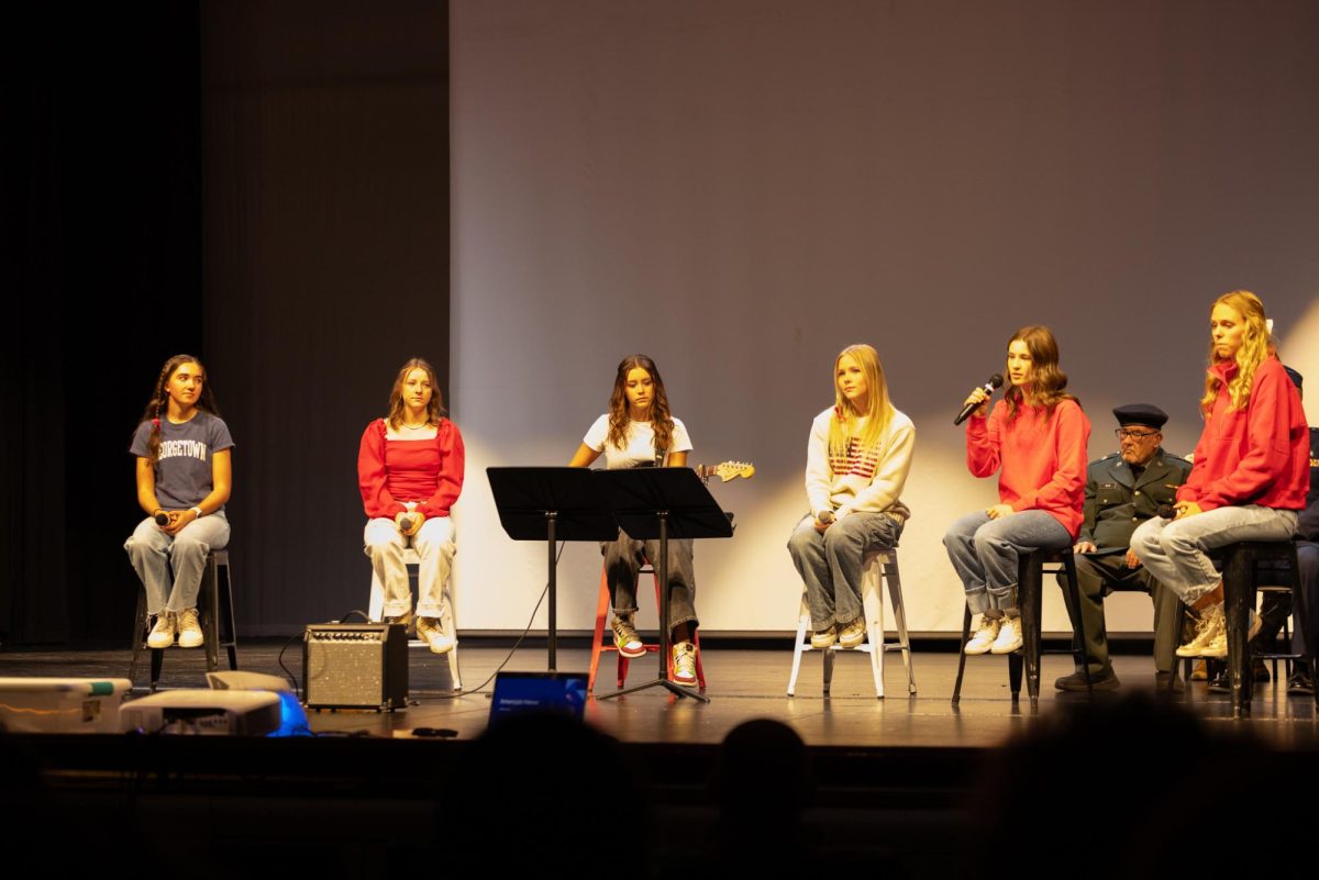 A quintet of talented singers set the tone for the Veteran's Days assembly by singing the song Travelin Soldier.