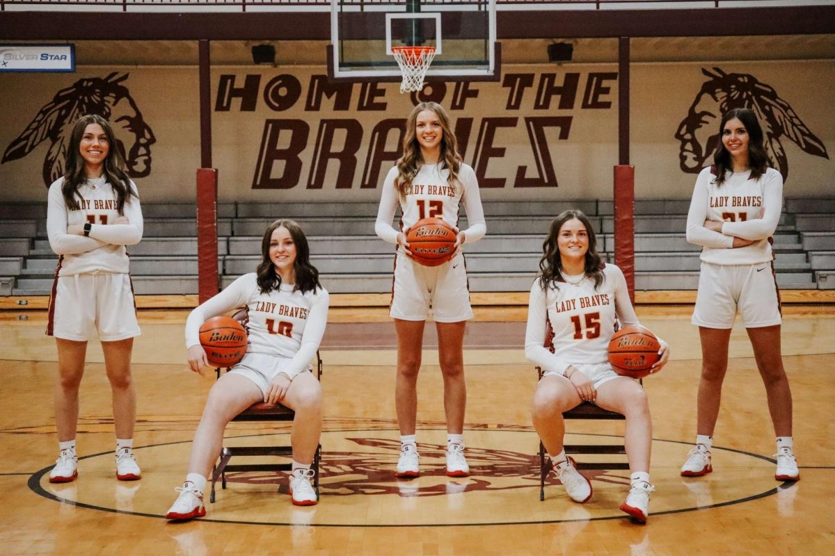 Semiors Makell Haderlie, Austyn Bagley, Torrie White, Kambree Johnson, and Emily Dana all pose for their senior picture. These girls have been playing together since middle school, are still best friends, and hope to make a state tournament run. "It's been super fun playing, with them this year it's different knowing it's our last year playing together but we always make the best of it" said Dana. 