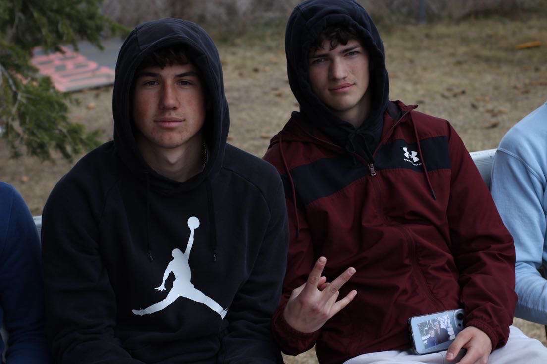 Taking a break before they run the 100m, Paxton Beebe and Teagan Barclay have a chance to soak in the track experience. Both of these two had the opportunity to go to state and represent the school last season. Fellow senior Kelby Stephens is also soaking in the indoor experience. "I'm not much in to running, but I like to throw, and so I decided to do shotput," said Stephens.