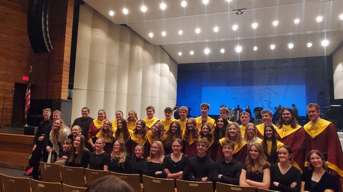 Orchestra, band, and choir members gather together after a fun night. They practiced for hours with a professional conductor at state music. "Out of the 450ish kids who performed, 46 of them were from Star Valley," said sophomore Hanne Opitz.