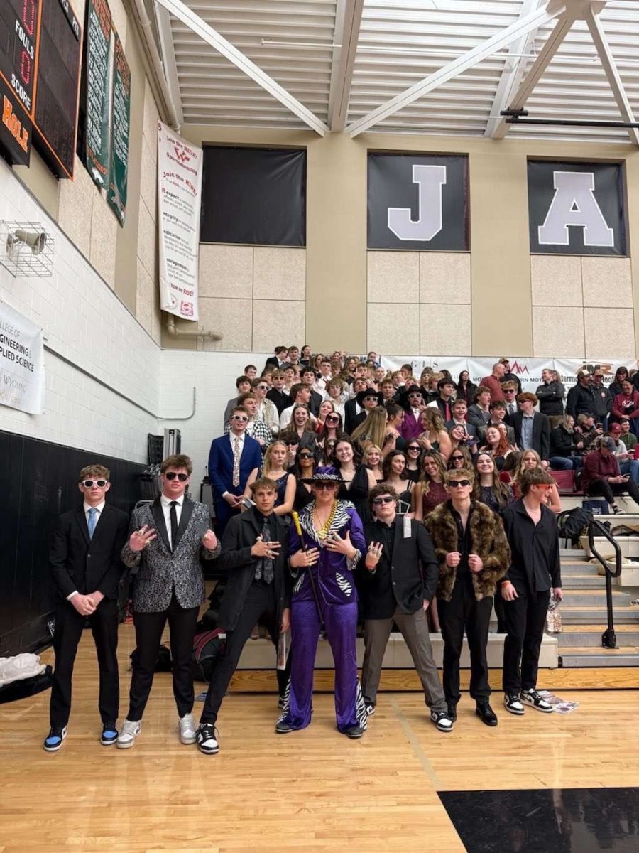 Star Valley fans assemble in their "Met Gala" best in Jackson to show support for the Braves. The theme for the night of "Daddy's Money" was a not-so-subtle dig at the Jackson student body. "It was so fun to support our team as well as being able to use our prom dresses again," said Maya Hyde. 