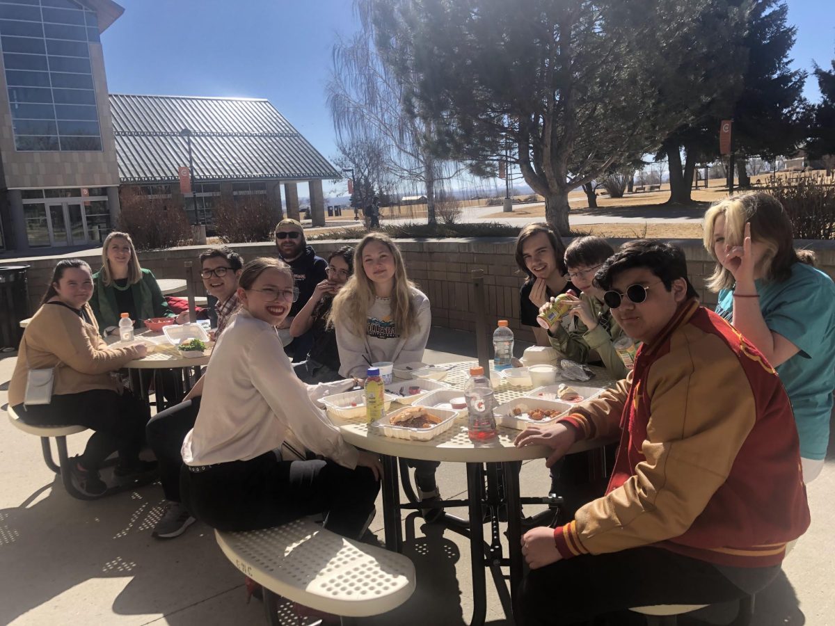 Members of the team eat lunch at the school in Riverton. Tournaments take a long time and students usually have to eat at the school where they are competing. Senior Kennadee Wheeler said, "Depending on the tournament, either the school or parents will feed us, but most of the time we just bring snacks."