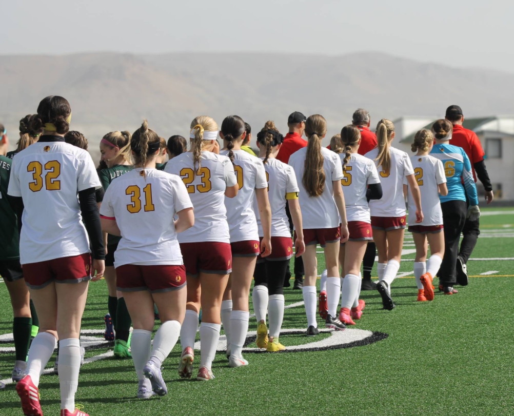 The Lady Braves walk onto the field with confidence against the Green River Wolves. Green River recently moved up to 4A for soccer. The team was not sure what to expect but felt excited for the new competition.