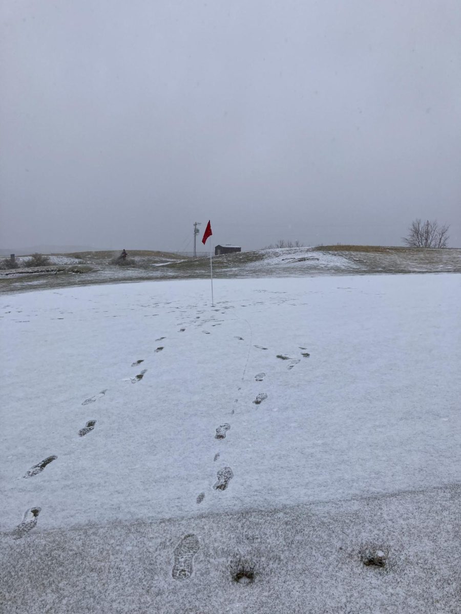 This snow covering a green at White Mountain golf course in Rock Springs resulted in cancellation of the tournament.