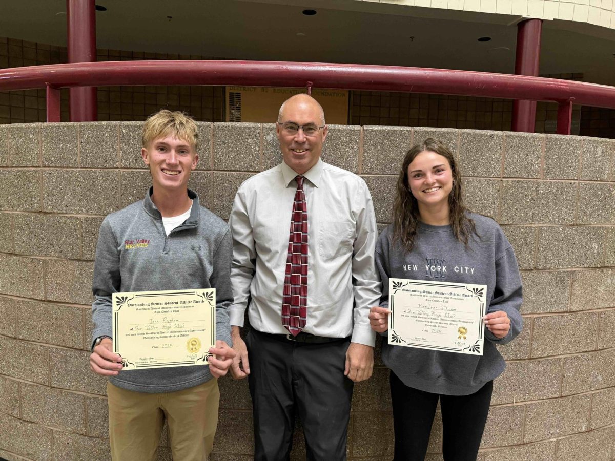 Southwest District Administrators Association Outstanding  Senior Student  Athletes Jase Burton and Kambree Johnson stand with SVHS Activities Director Robert Erickson. Burton and Johnson were selected to represent their region as student athletes who have exemplified excellence in the classroom and in athletic competition. 
"I'm proud of the way Jase and Kambree have represented us over the years as impressive scholars and athletes," said Erickson.