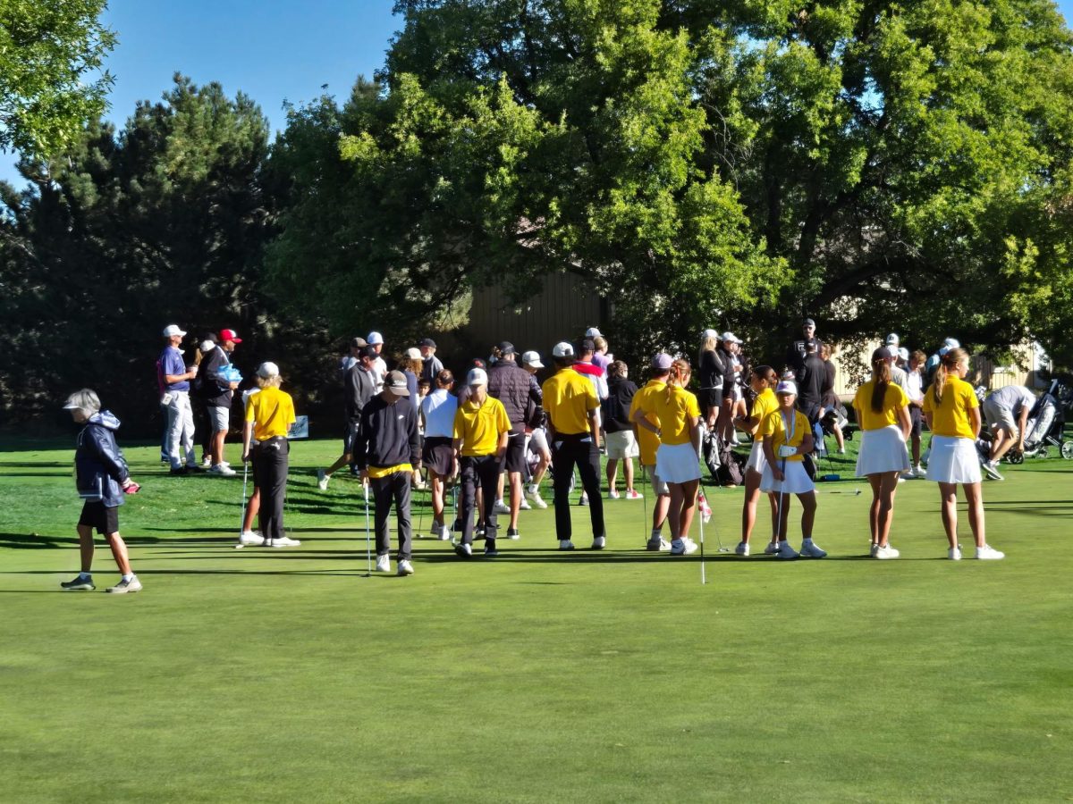 As the Star Valley Braves get ready to tee off, they congregate on the practice green at the Airport Course in Cheyenne to hear the officials as they discuss the rules governing the round. The Braves had a good season and qualified both girls and boys teams for the state tournament. The first day was a little rough due to nerves but on the second day the Braves showed that they could play and compete with the other top teams in the state.
