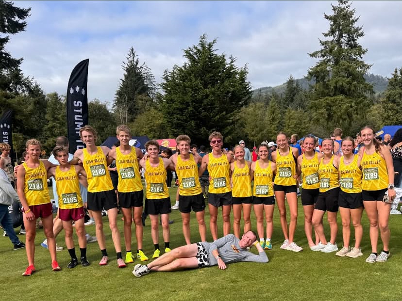 The Star Valley varsity cross-country team lines up for a photo at the finish line in Tillamook, Oregon. Each athlete pushed through the race, representing their school with determination and hard-work. Every runner set a new personal record, highlighting the teams steady progress this season. 