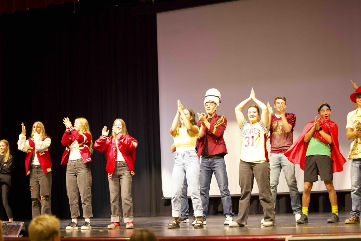 Student Body Officer's come together to show student a new dance. 