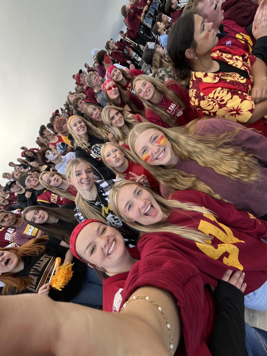 The Student Section goes wild. The Braves gave the crowd a lot cheer about as they destroyed the Powell Panthers 61-0. Kaydee Coats (left ) said, "My favorite part of the football game was the overall atmosphere of the student section. Just being there while everyone lost their mind after every touchdown is one of my absolute favorite things."