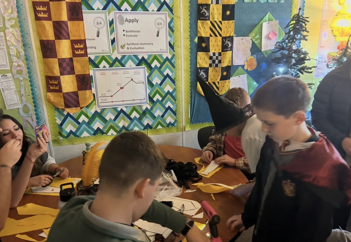 A Magical Day in the Making. Speech & Debate volunteers guide sixth graders through tie-making and crafts during Etna Elementary’s Harry Potter celebration. "It was a lot of fun being able to get to know the 6th graders and being able to see the excitement on their faces when we were there to hang out with them!” said Josey O’Donnell.