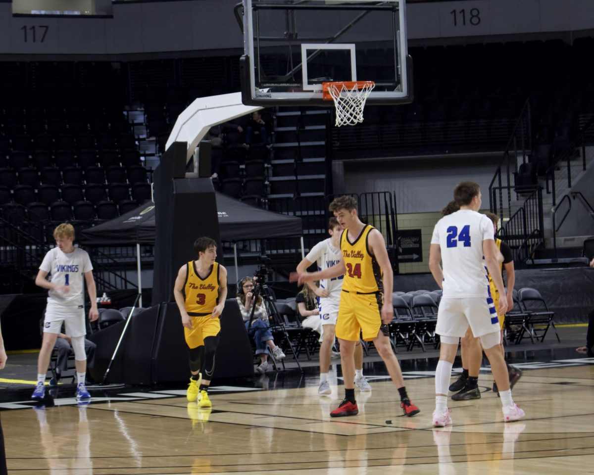 Star Valley players reset on defense during their opening-round matchup against Coeur d’Alene. The Braves opened the year with dominant play and hard-fought battles in Idaho Falls. Dylan Shumway, #3, said, "I was just making sure I got back on defense, so we didn't give up an easy transition bucket."