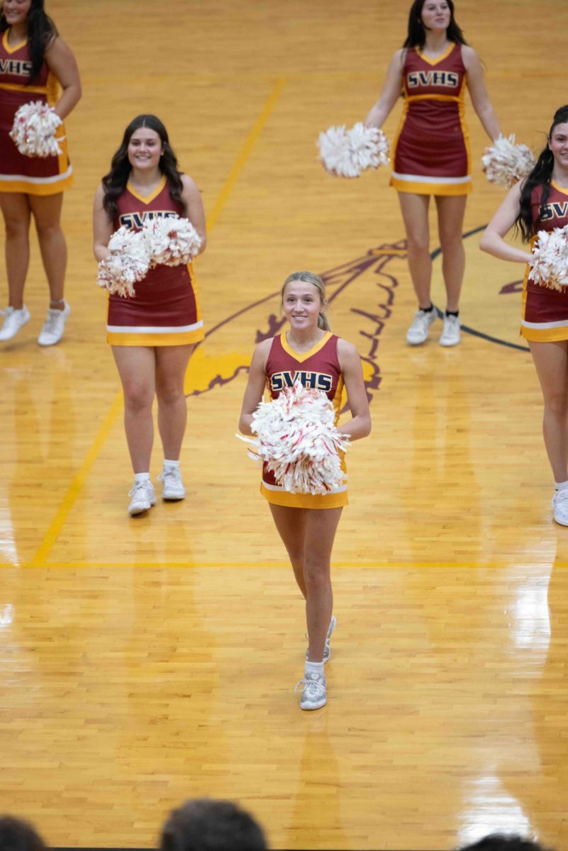 The cheerleaders wrap up a pep assembly on Jan 15 in the gym in front of the student body. 