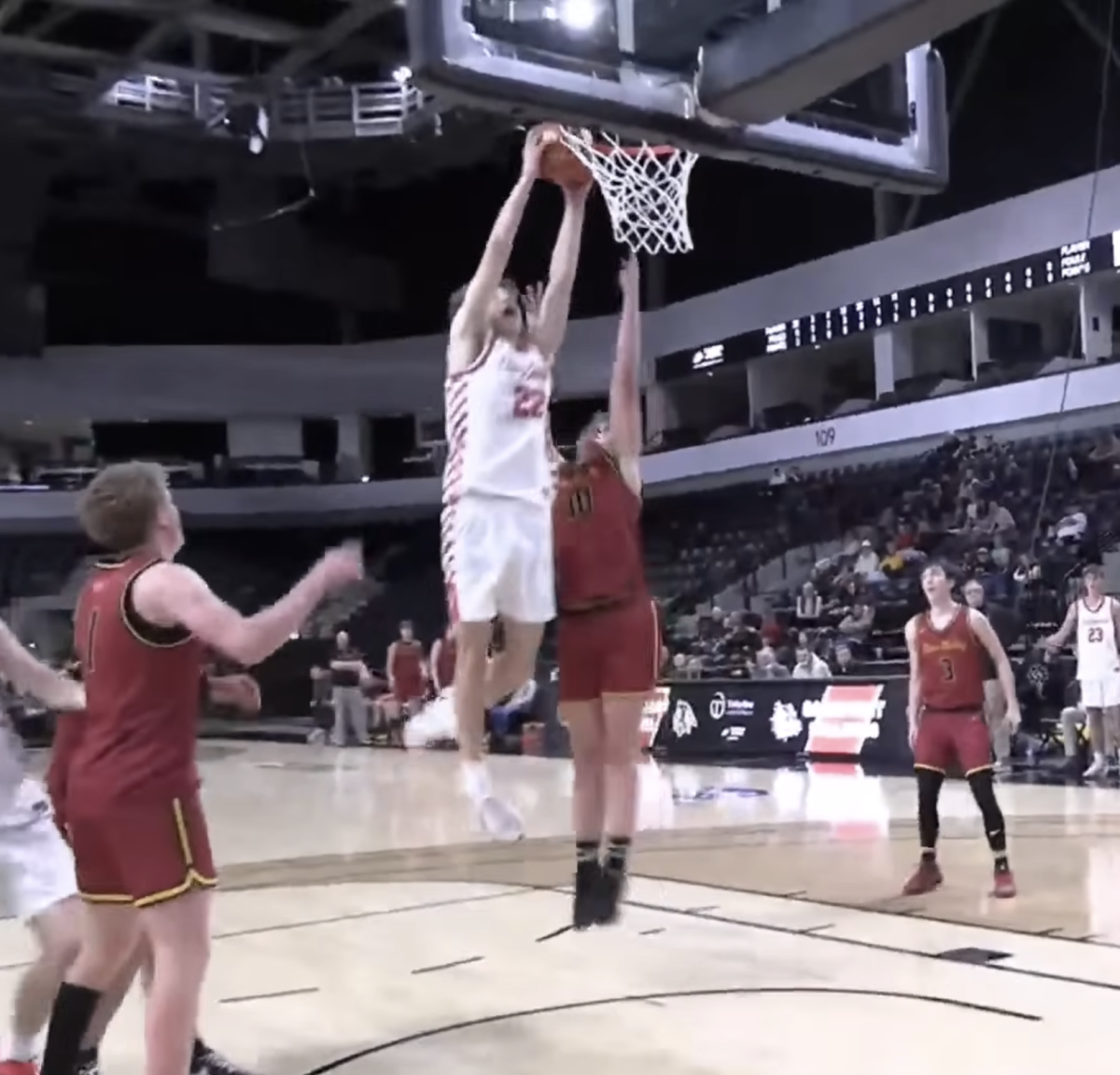 Senior Mason Kleeman gets dunked on at the TitleOne Tip Off Classic vs. The Sandpoint Bulldogs. Kleeman says," I thought it was cool watching the dude fly over my head."