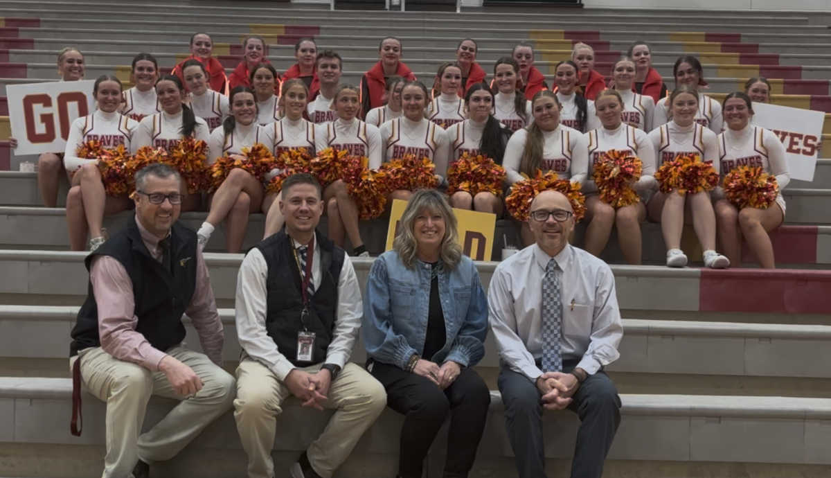 After the State Spirit Sendoff assembly, both dancers and cheerleaders get together to take a picture with SVHS administration before  the state competition. The squads performed their state routines for the student body in the gymnasium. Sophomore Brave Cadette Mady Mosgeller said, "The biggest challenge at the state was girls being in their own heads and worrying about the dance. We had to come together and trust ourselves!"