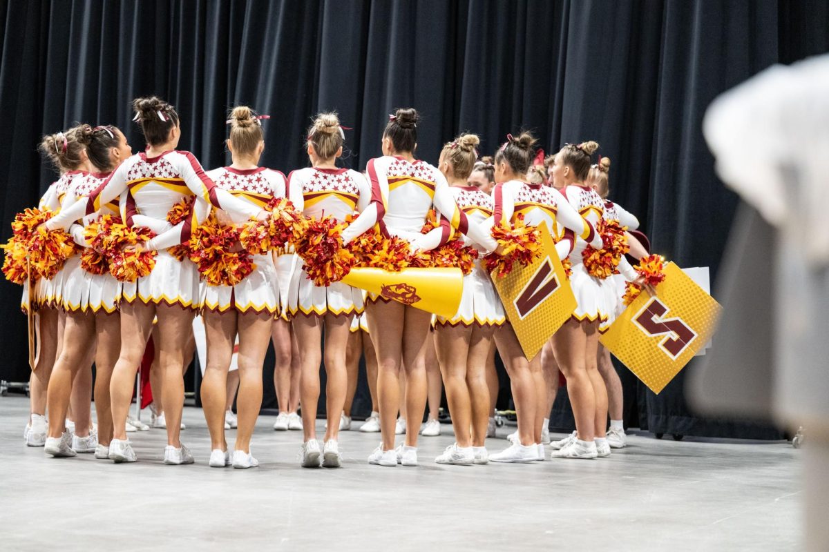 The cheer team gets ready to hit the floor at the Ford Event Center in Casper Wyoming for their state competition.