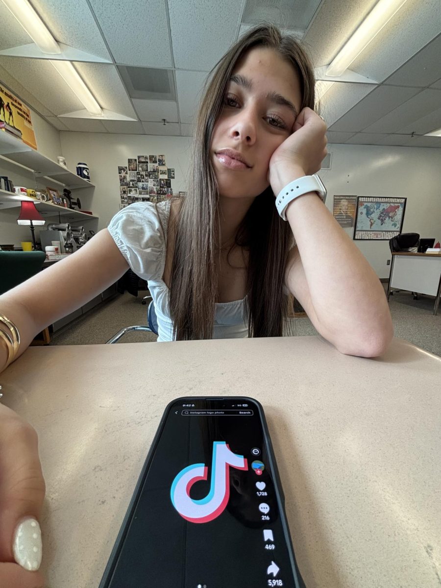 Freshman Silver Weber scrolls on Tiktok during a class. *Not during school hours, for legal purposes*