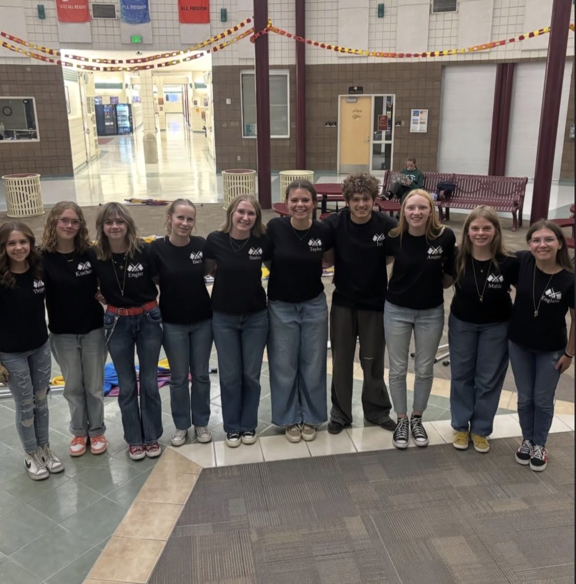 Taggart Ivie with the rest of the color guard squad, showing off teamwork and dedication before they enjoy Thanksgiving break with family.