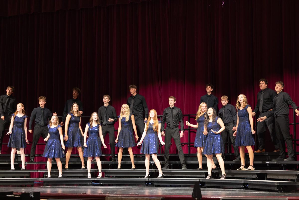 Singco choir students perform for the judges during their final day at the District Music Festival, focusing on blending their voices and delivering one of the most challenging pieces they prepared all trimester; the group earned a superior rating for their performance, marking a major accomplishment at the event. Senior Mya Allred said, “It was really rewarding to see all of our hard work pay off, especially being able to perform at such a high level with everyone working together.”