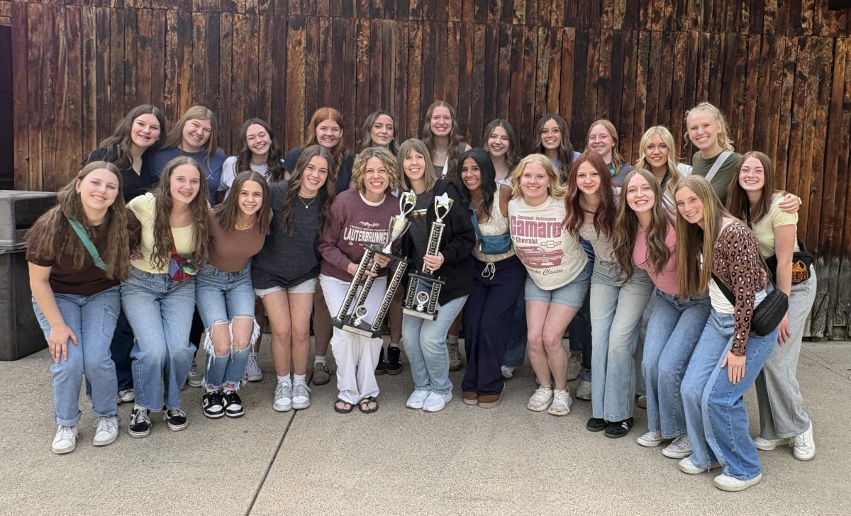 The Treble Tones group show off their trophies. They won first place in the High School Women’s Choir division and first place overall for all high school choirs at the festival. Senior Clanci Osmond says, “Being able to show off what we can do with such an amazing group of girls has been a dream."